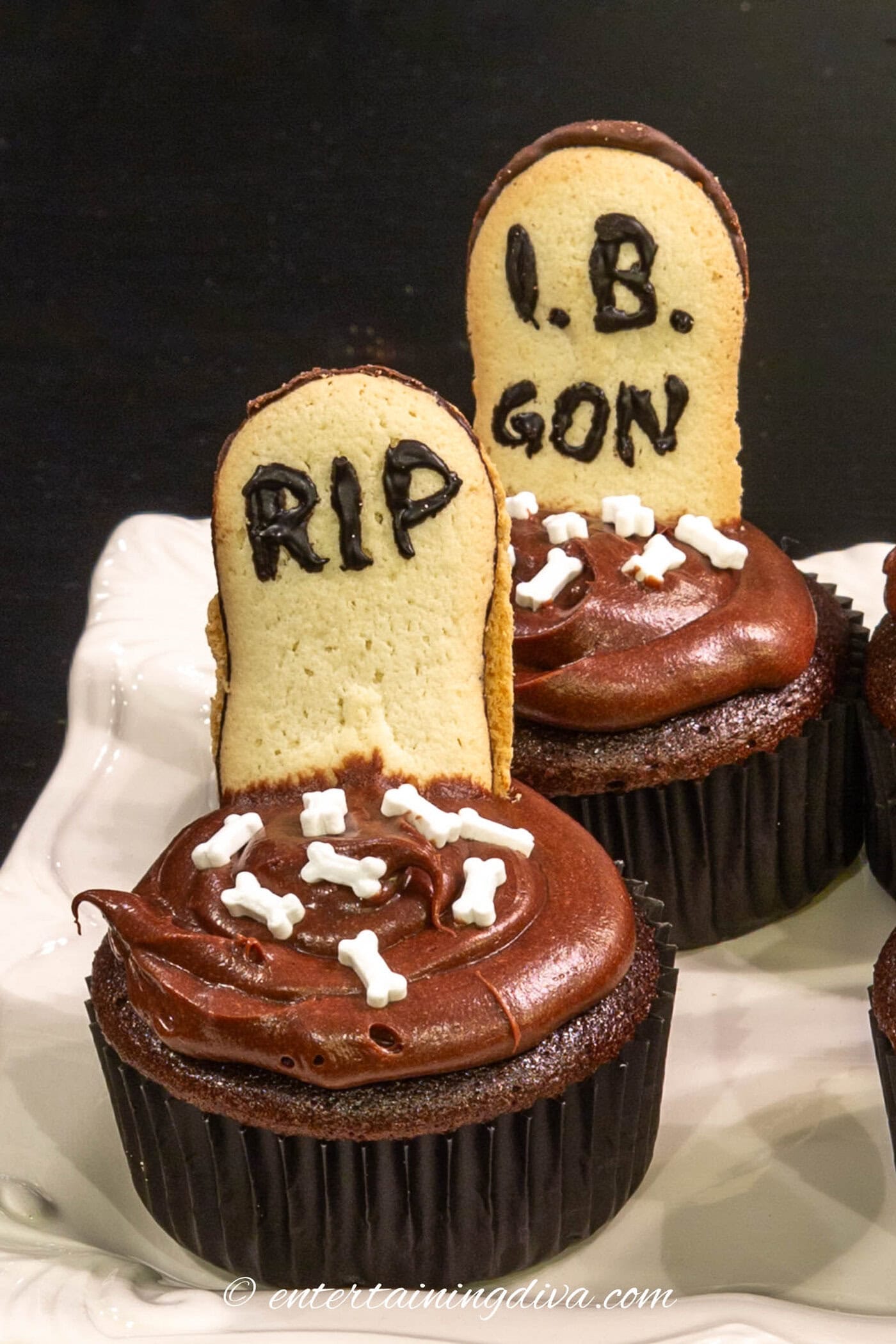 Halloween cupcakes decorated with cookie tombstones