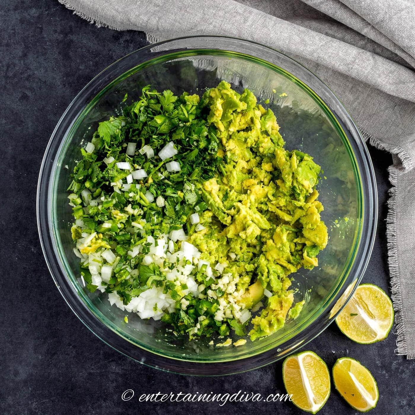 Halloween guacamole ingredients in a bowl