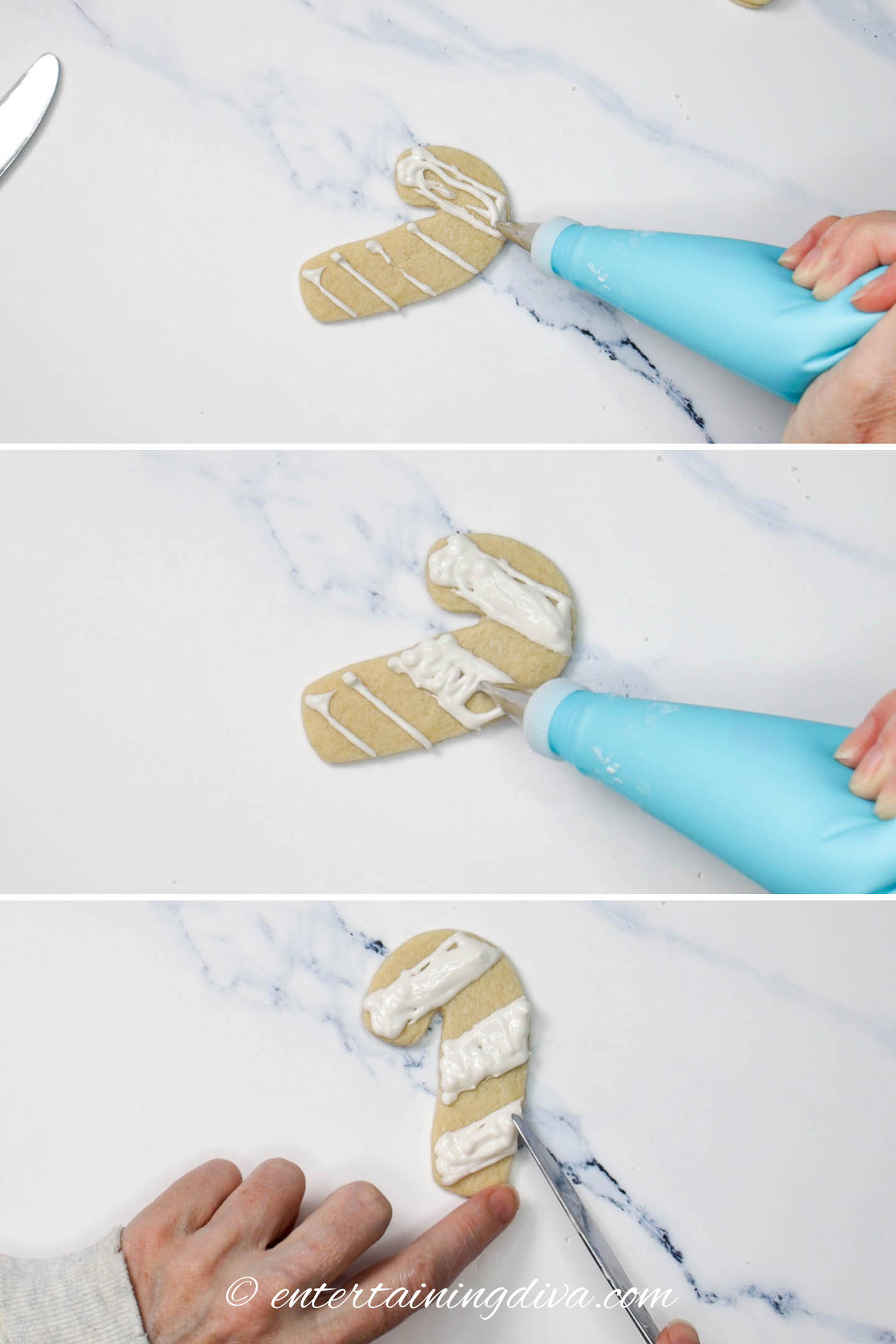 Filling in the candy cane stripes with a piping bag full of white royal icing