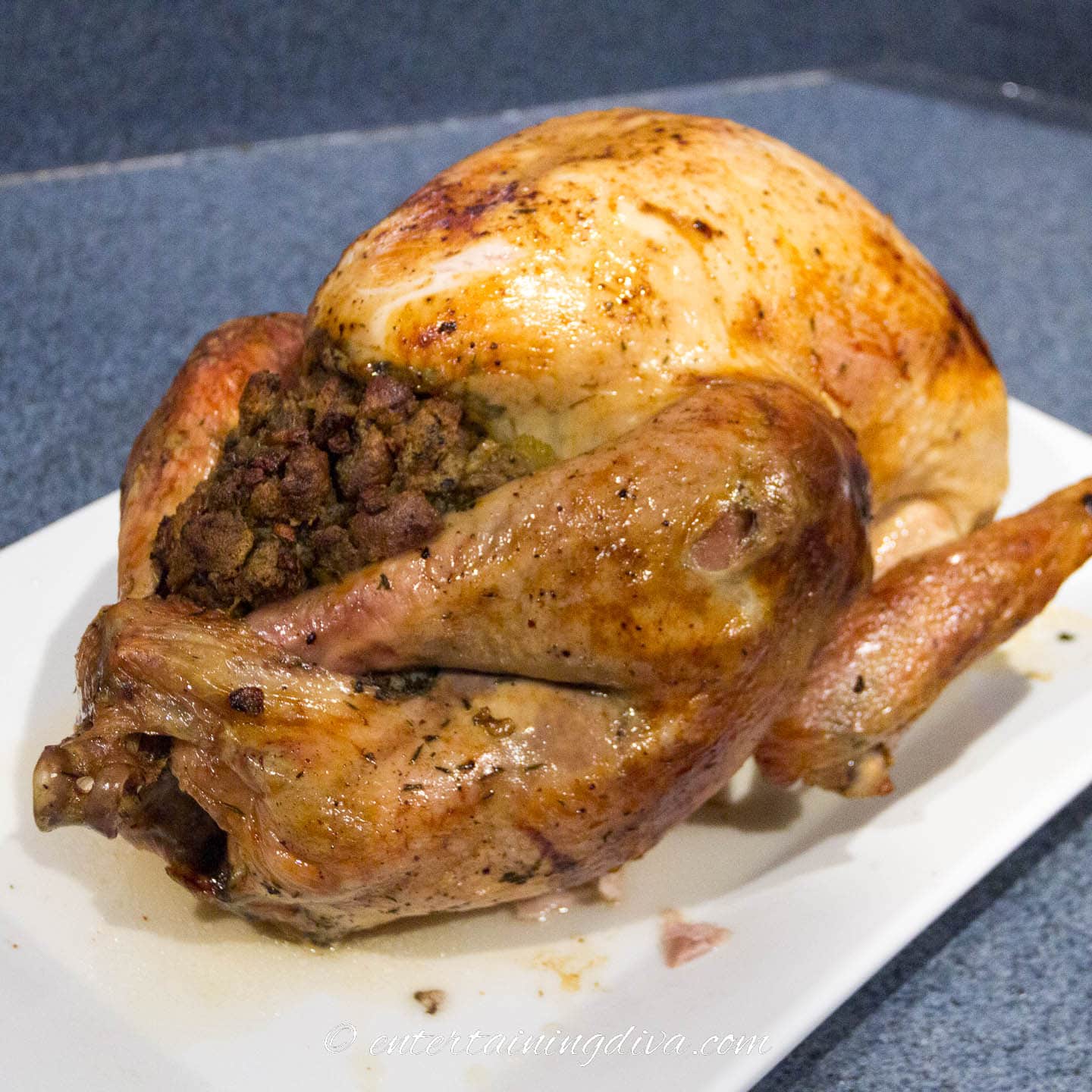 roasted turkey with stuffing on a platter