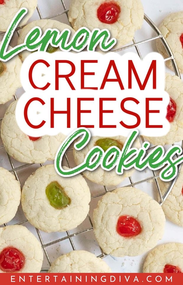 Lemon Cream Cheese Cookies with red and green glazed cherries on a wire rack.