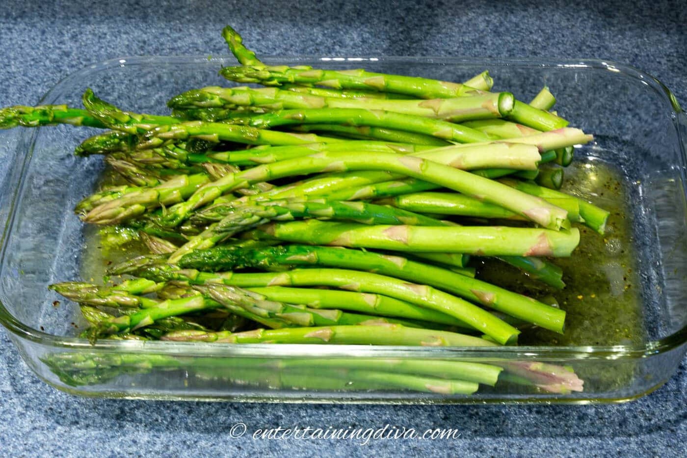 asparagus tossed in lemon garlic marinade