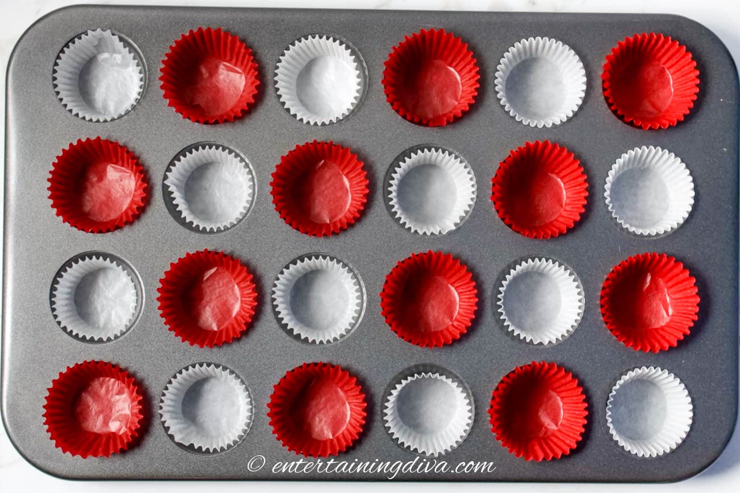 Mini muffin tins with red and white liners