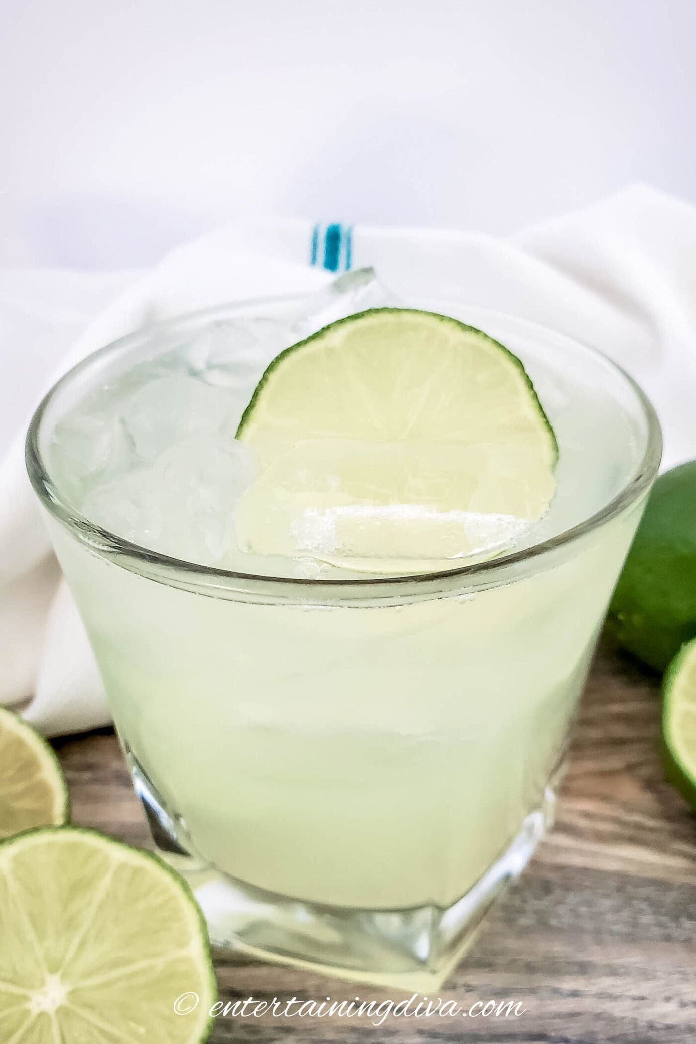 margarita made with margarita mix and garnished with a lime wheel