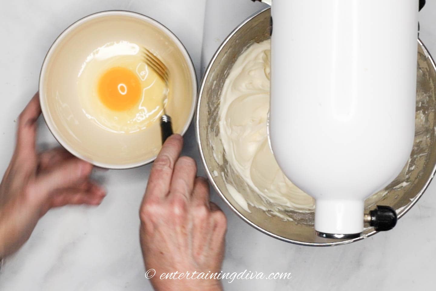 Egg in a bowl being beaten with a fork