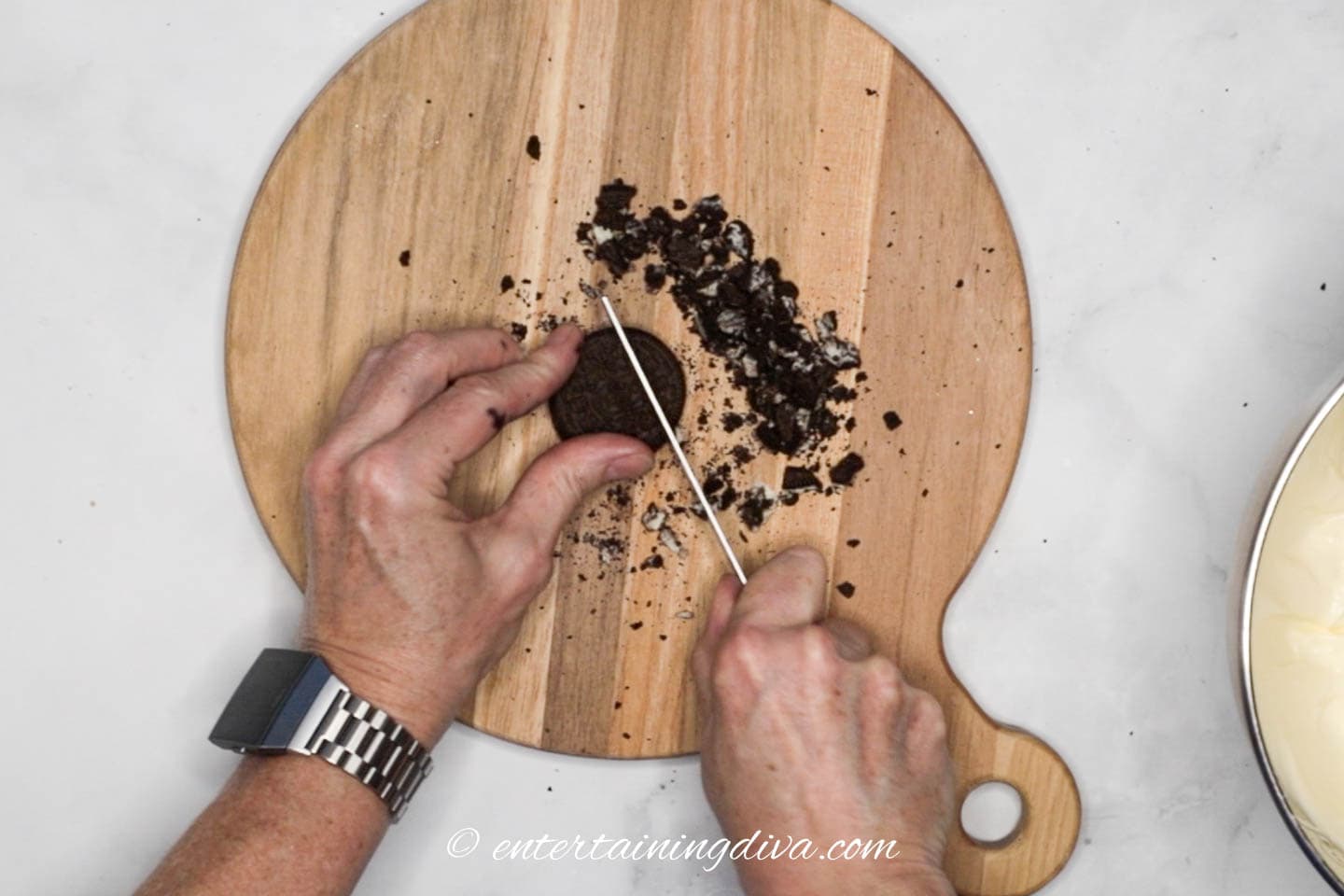 Oreo cookies being chopped