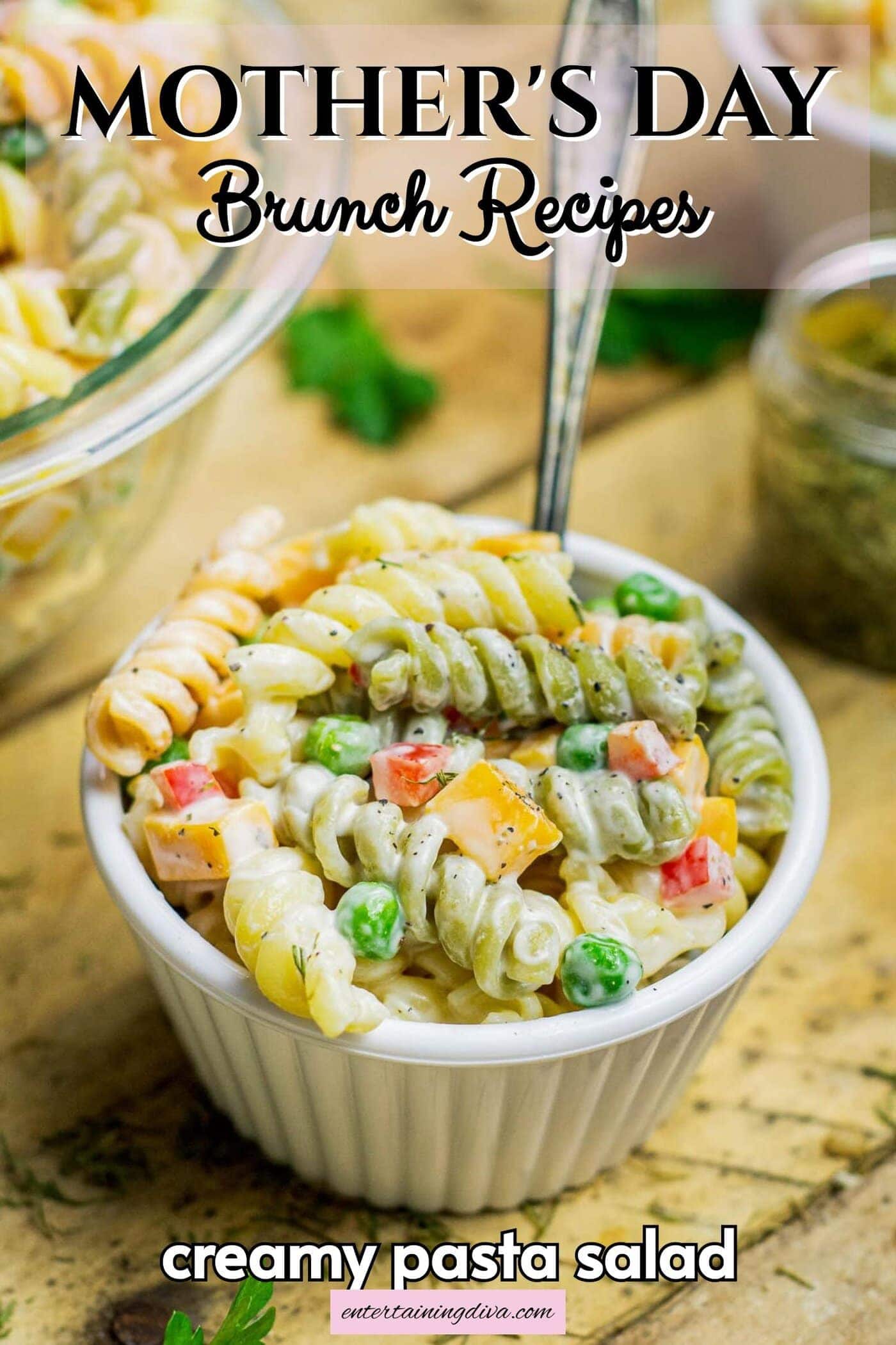 A small bowl of creamy pasta salad beside a serving bowl of it