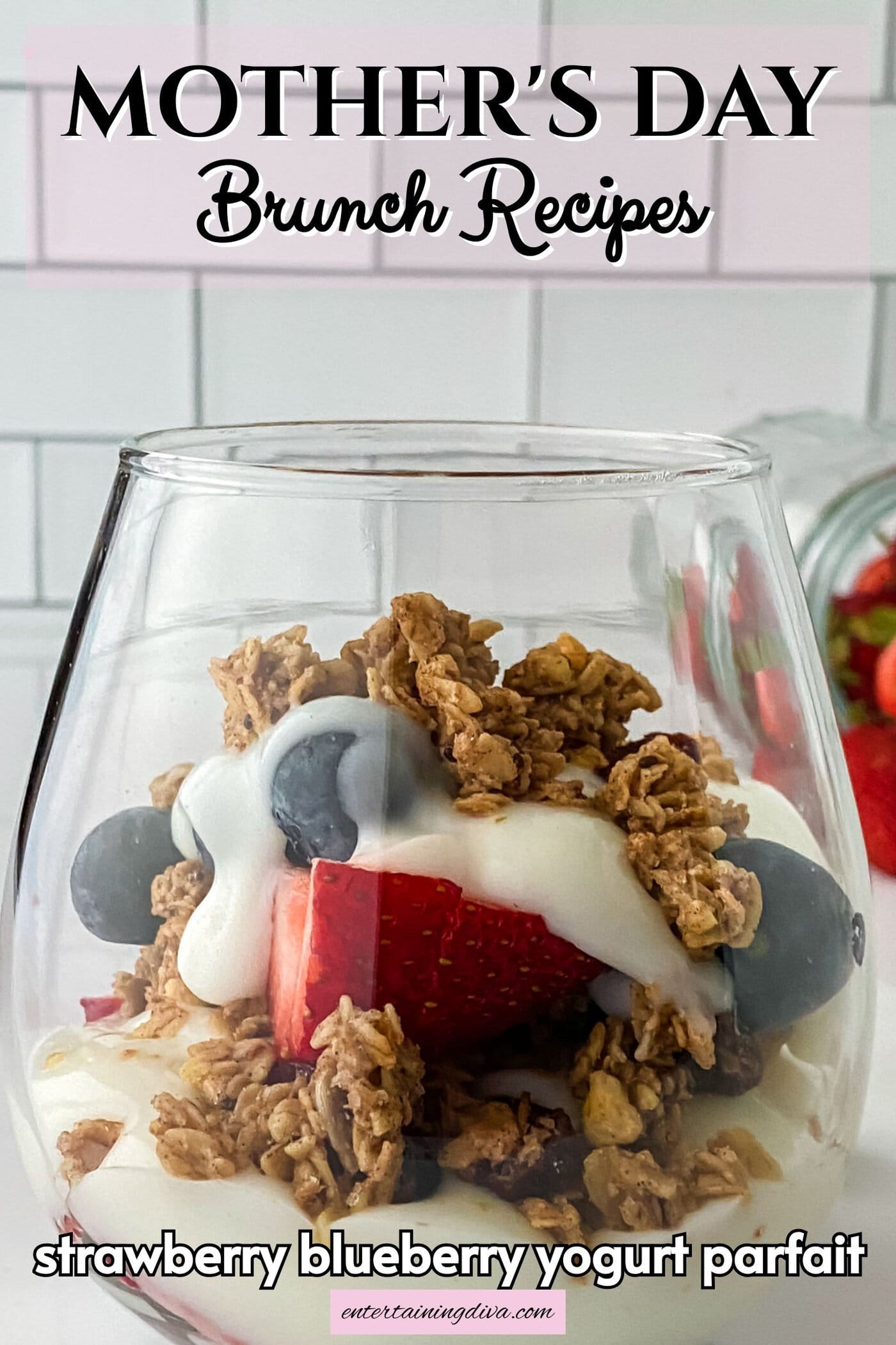 strawberry blueberry yogurt parfait in glasses