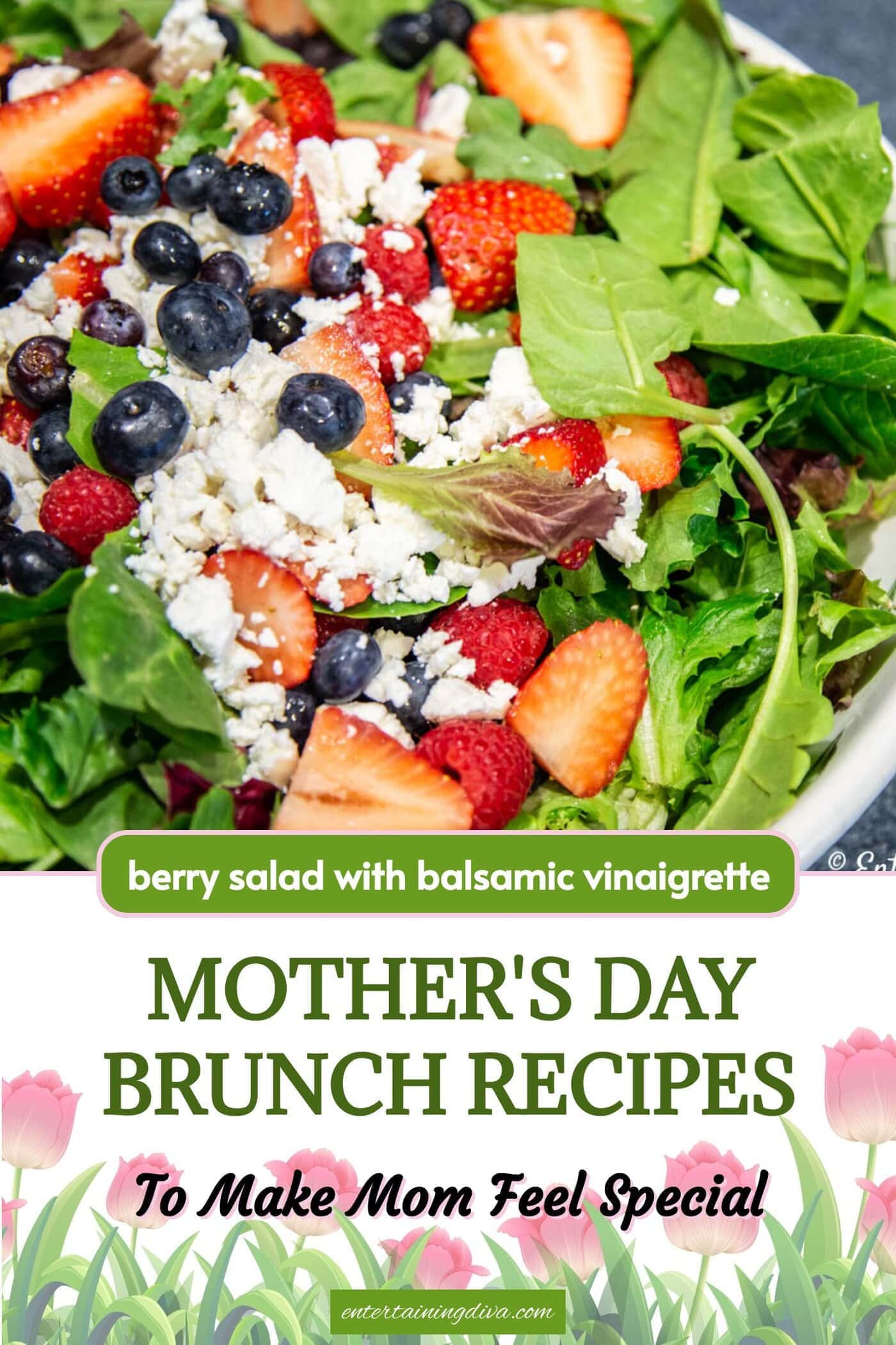 Salad made with strawberries, blueberries, raspberries and goat cheese on mixed greens