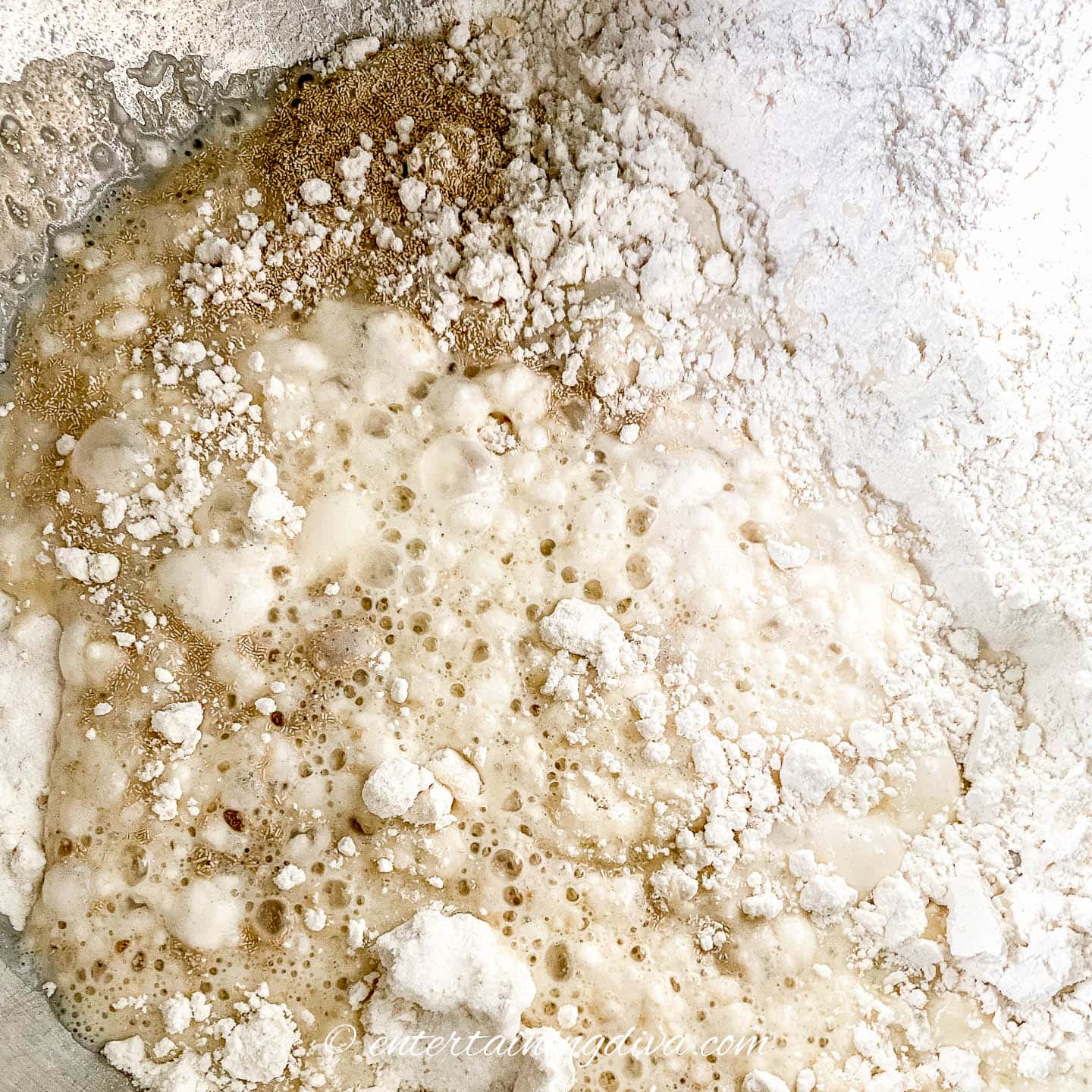 cinnamon roll liquid and dry ingredients in a mixing bowl