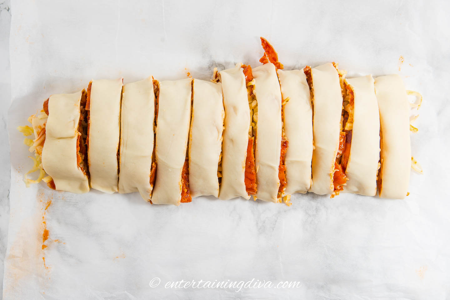 A pepperoni pizza rollup log after it has been sliced
