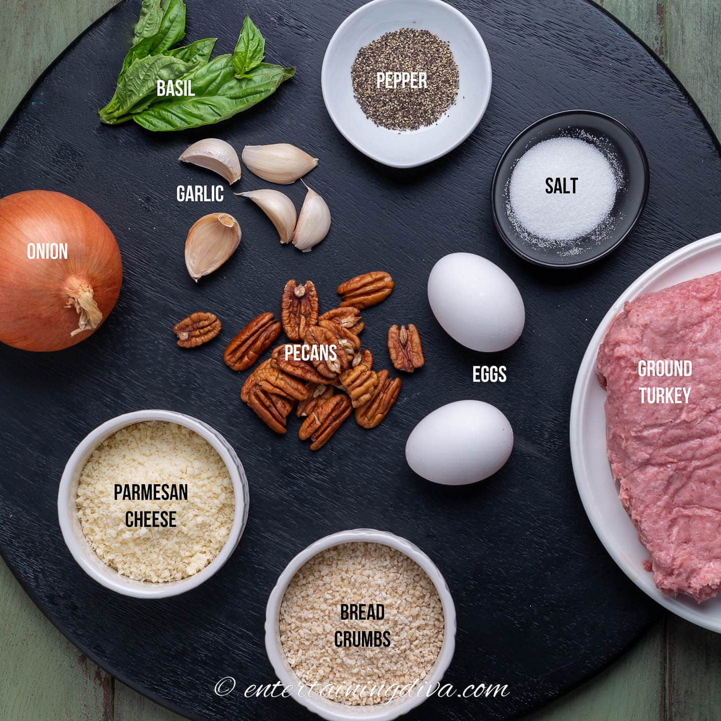 Grilled pesto turkey burger ingredients on a cutting board