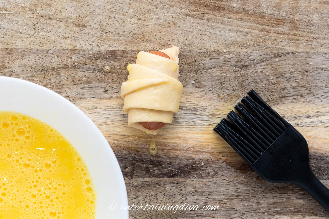 pigs in a blanket with egg wash brushed on top