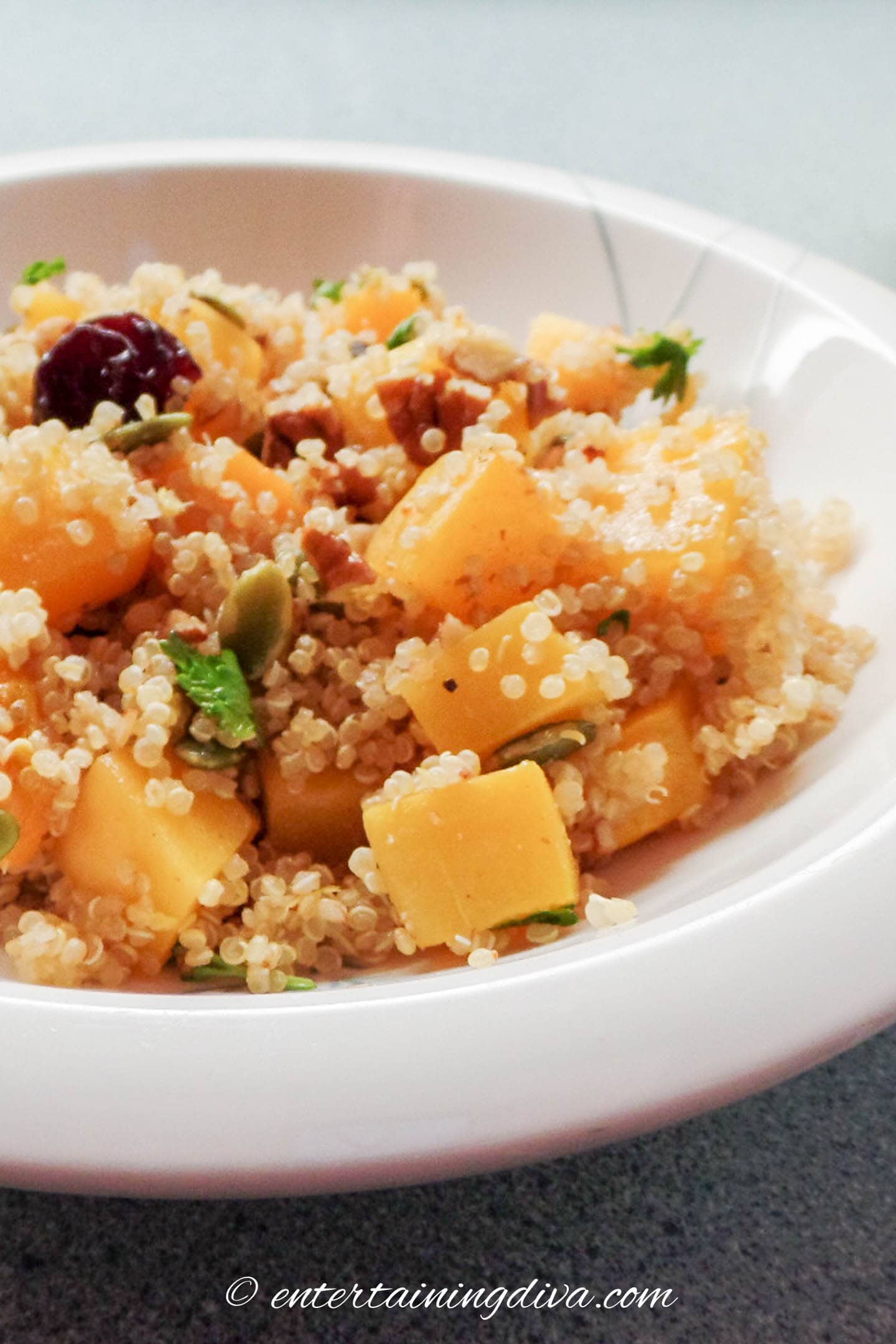 Quinoa pilaf with butternut squash in a bowl