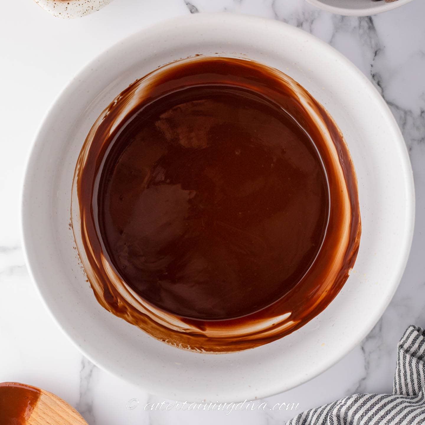 Chocolate and butter melted in a bowl