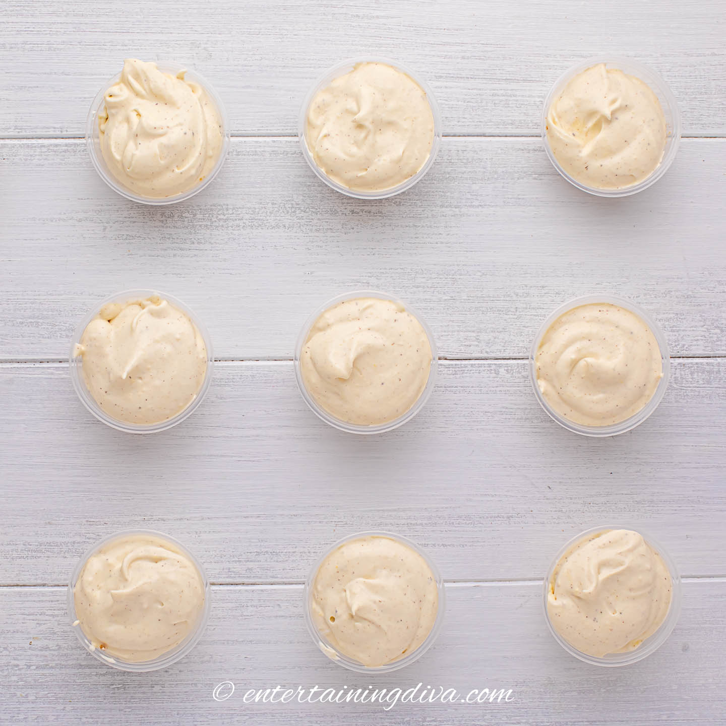 Overhead picture of RumChata Christmas pudding shots in Jello shot cups