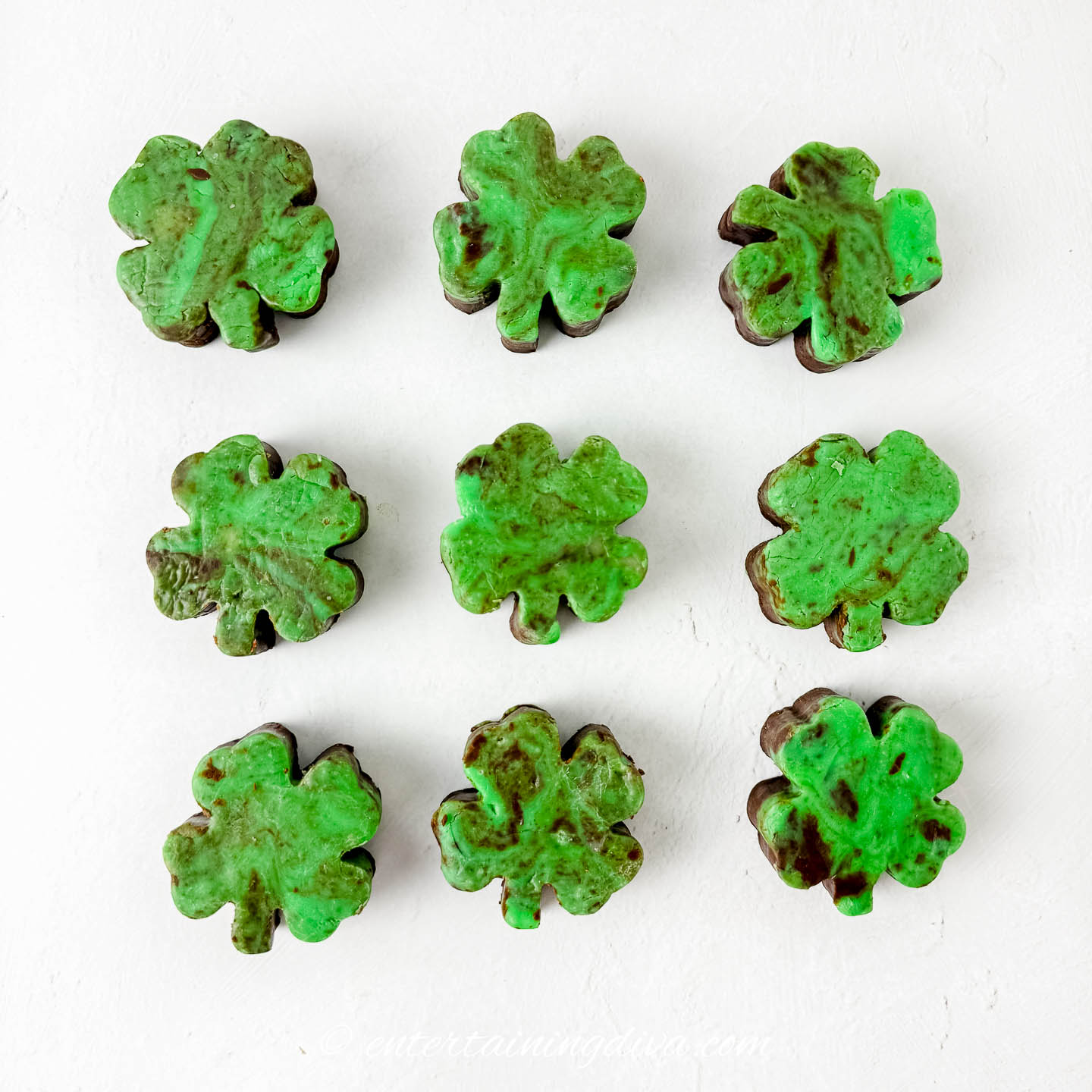green and brown mint chocolate fudge cut into shamrock shapes
