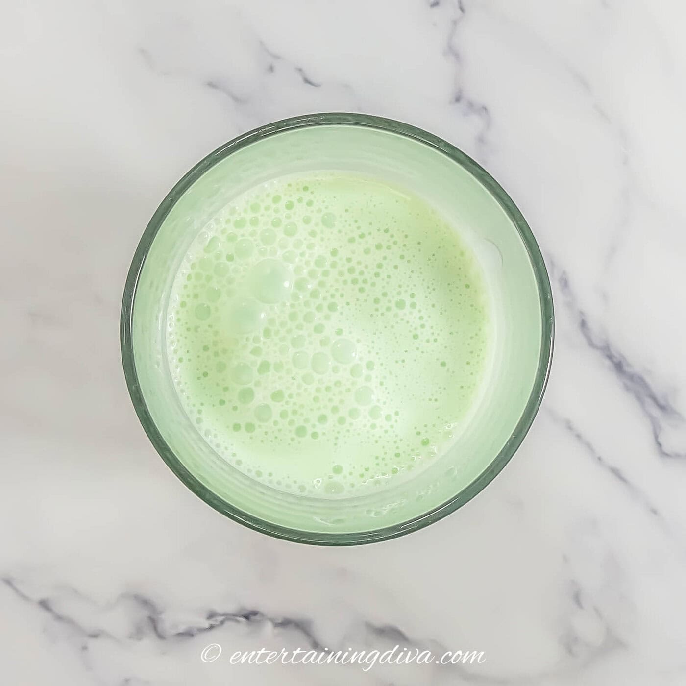 shamrock shake cocktail in a cocktail shaker