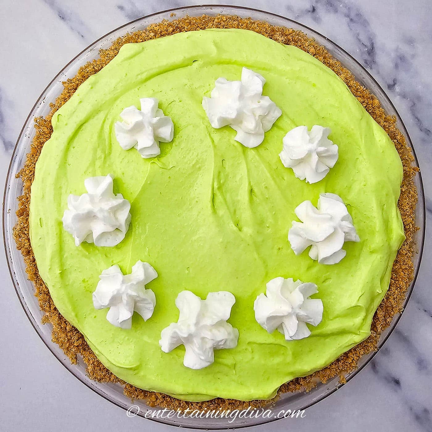 shamrock shake pie with 8 dollops of whipped cream