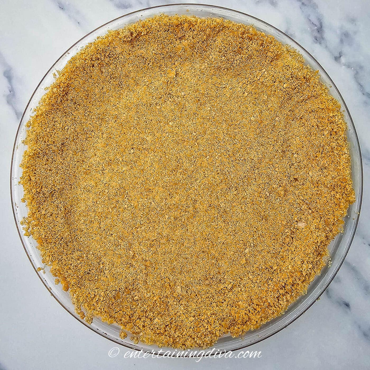 graham cracker crust in a pie pan