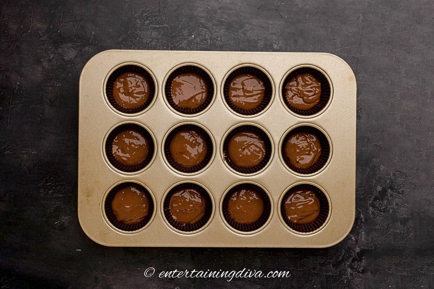 chocolate cupcakes in the pan before baking