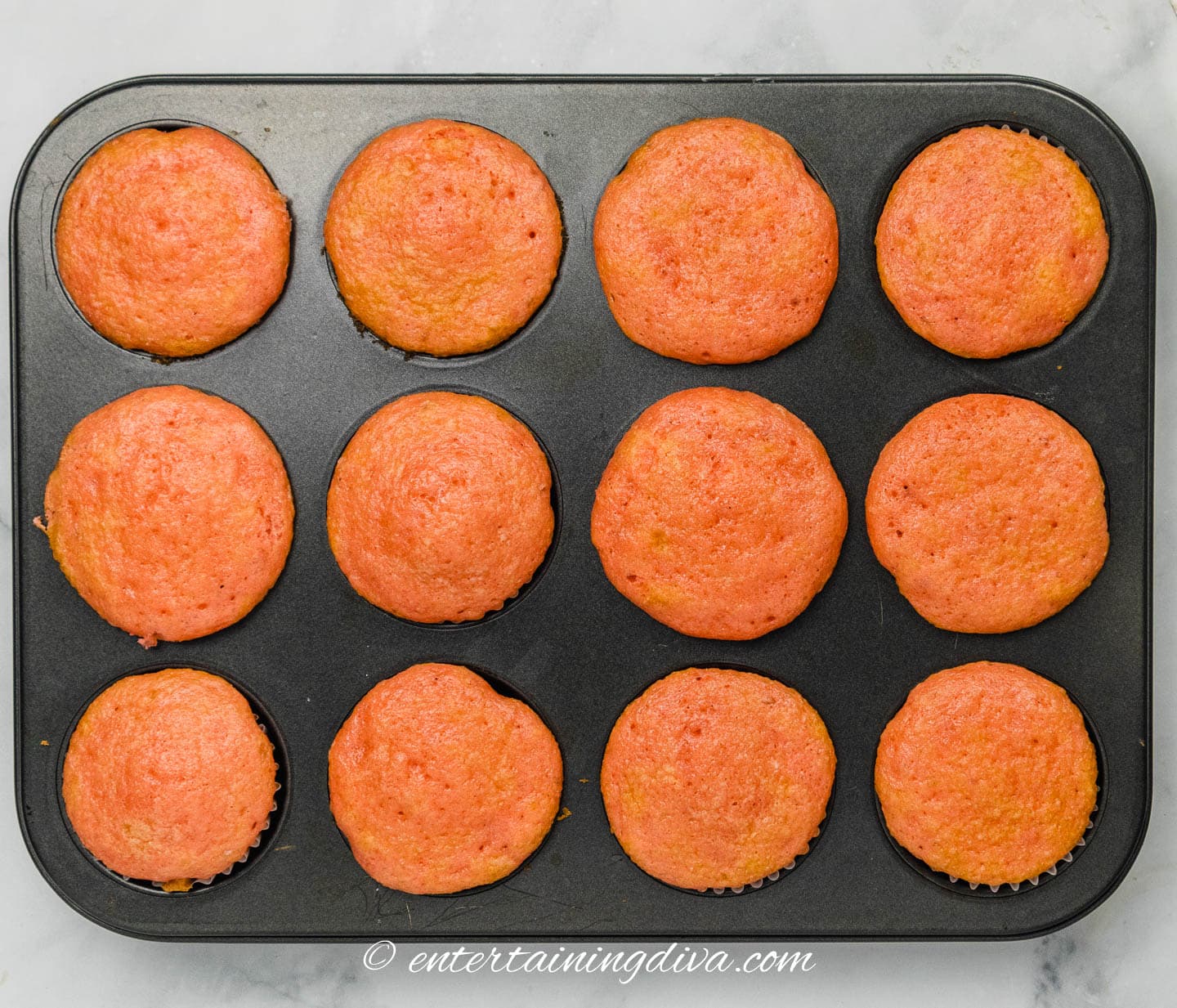 soda cupcakes in a cupcake tin after baking