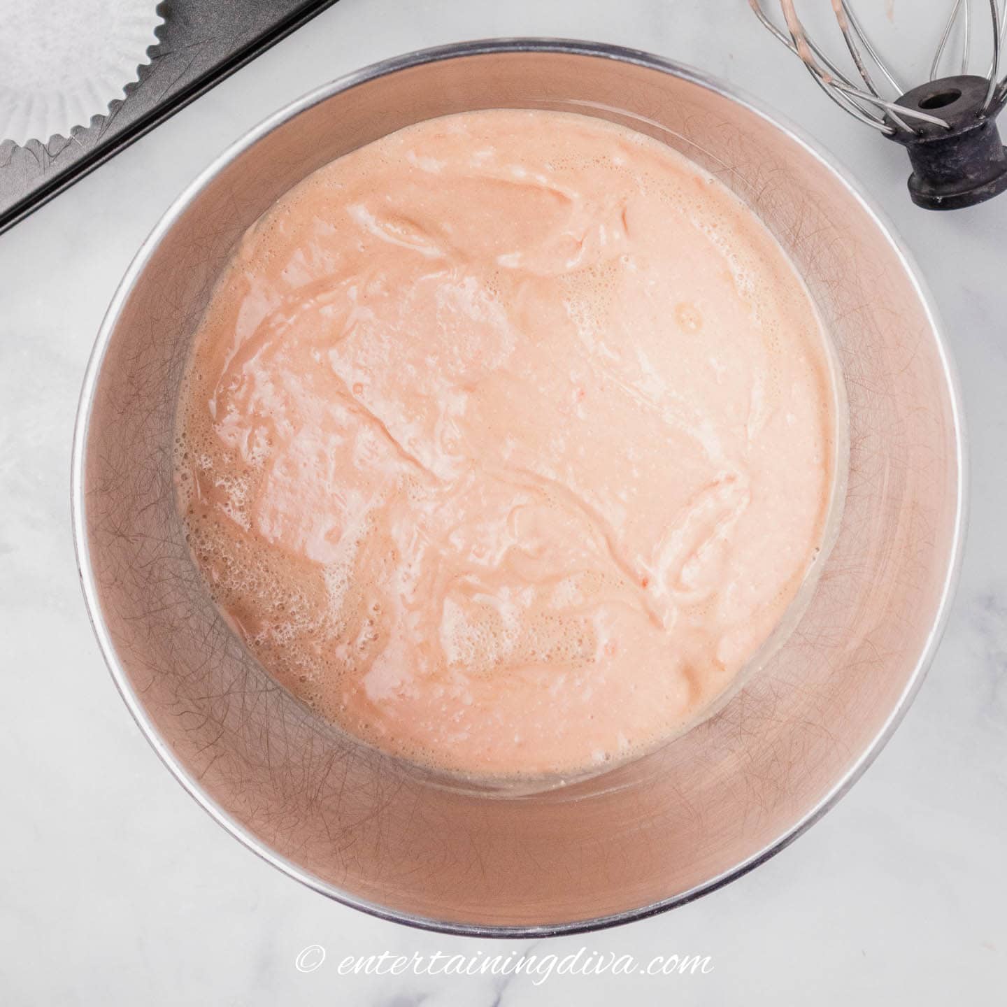 soda cupcakes batter in a bowl after adding soda