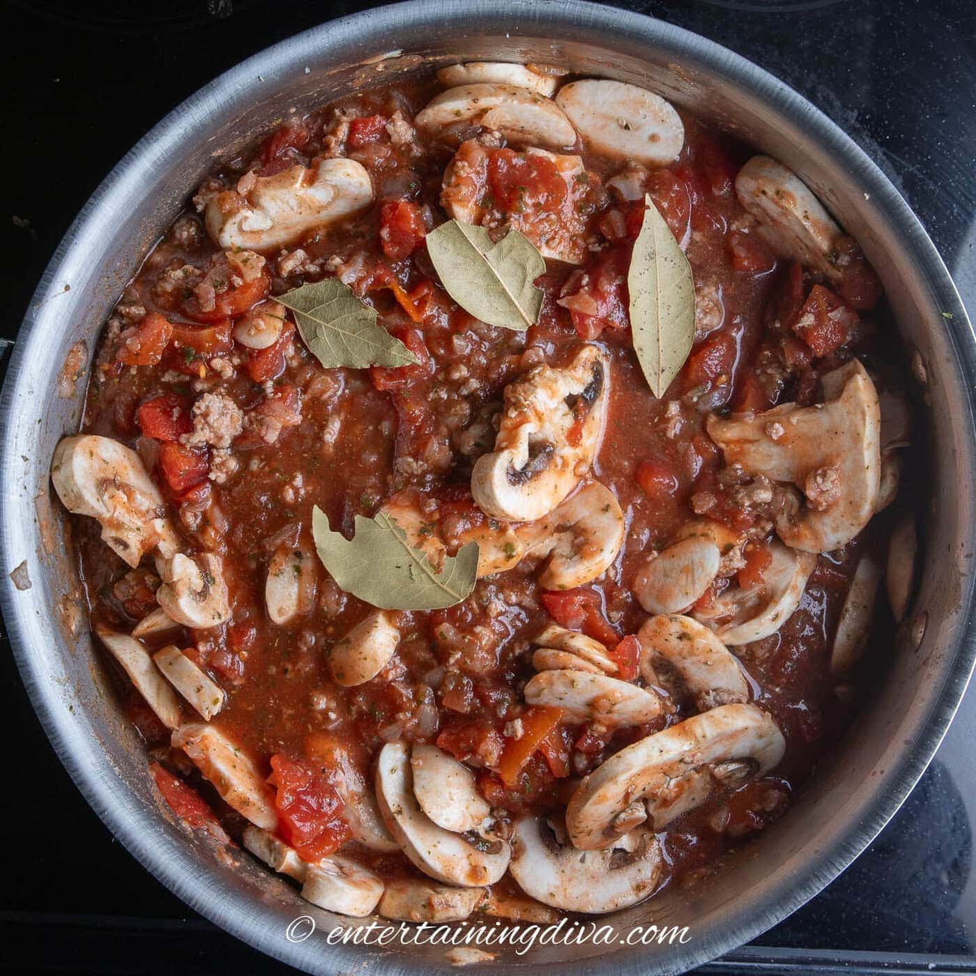 spaghetti meat sauce cooking in a stock pot