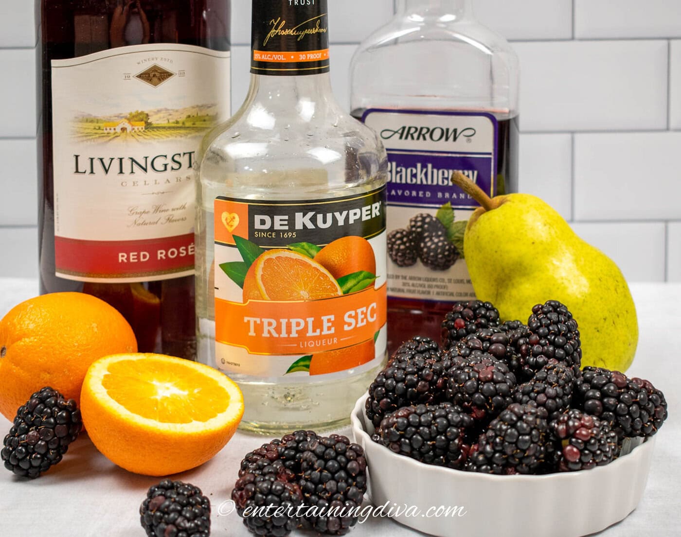 spooky blackberry Halloween sangria recipe ingredients - red wine, triple sec, blackberry brandy, blackberries, oranges and pears