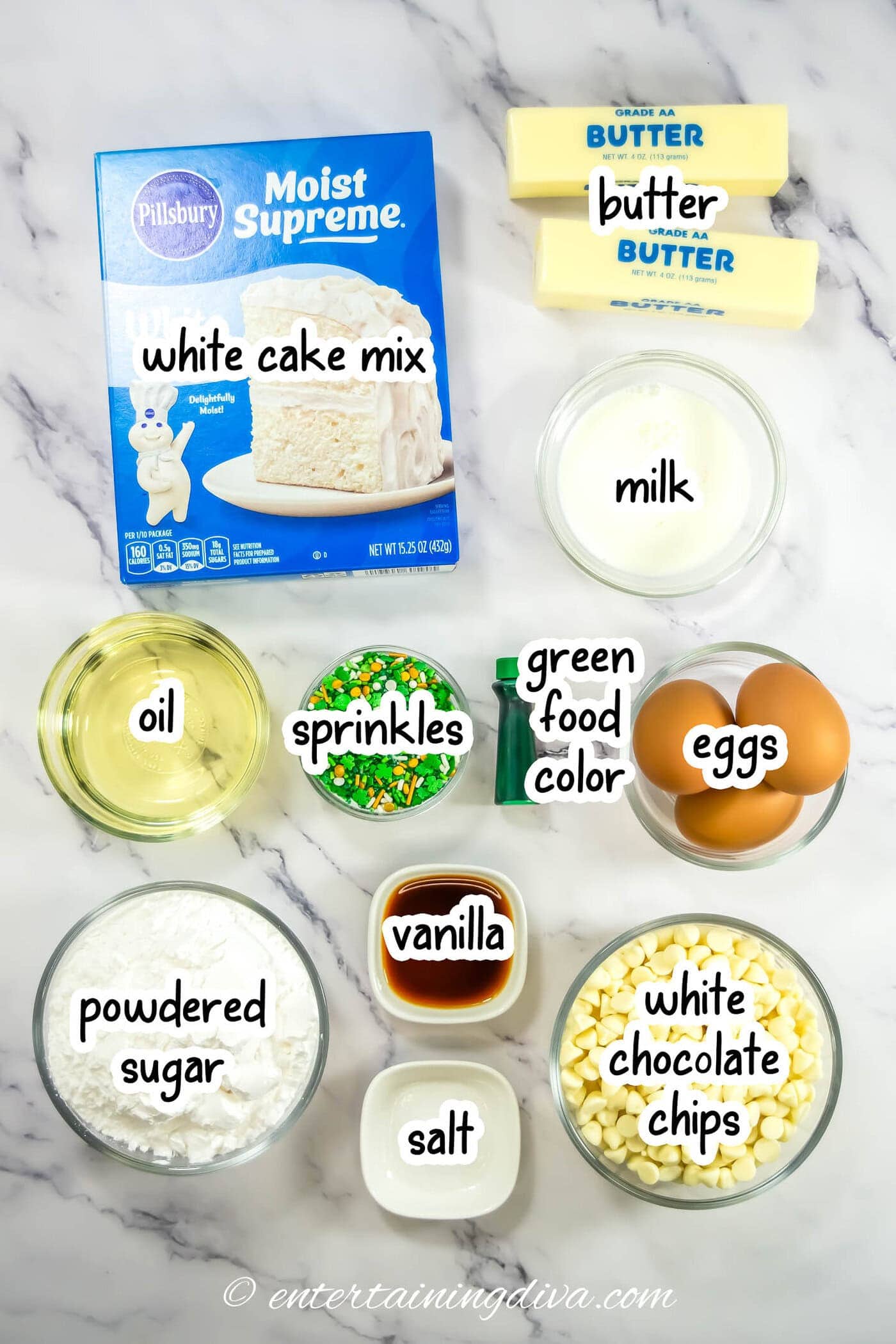 St Patrick's Day cake ball ingredients - white cake mix, butter, milk, eggs, green food color, oil, sprinkles, powdered sugar, vanilla, salt, and white chocolate chips