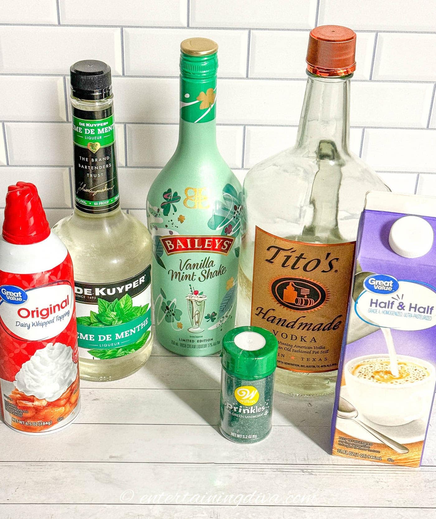 St Patrick's Day martini ingredients - creme de menthe, Bailey's vanilla mint shake, vodka, Half and Half, green sprinkles