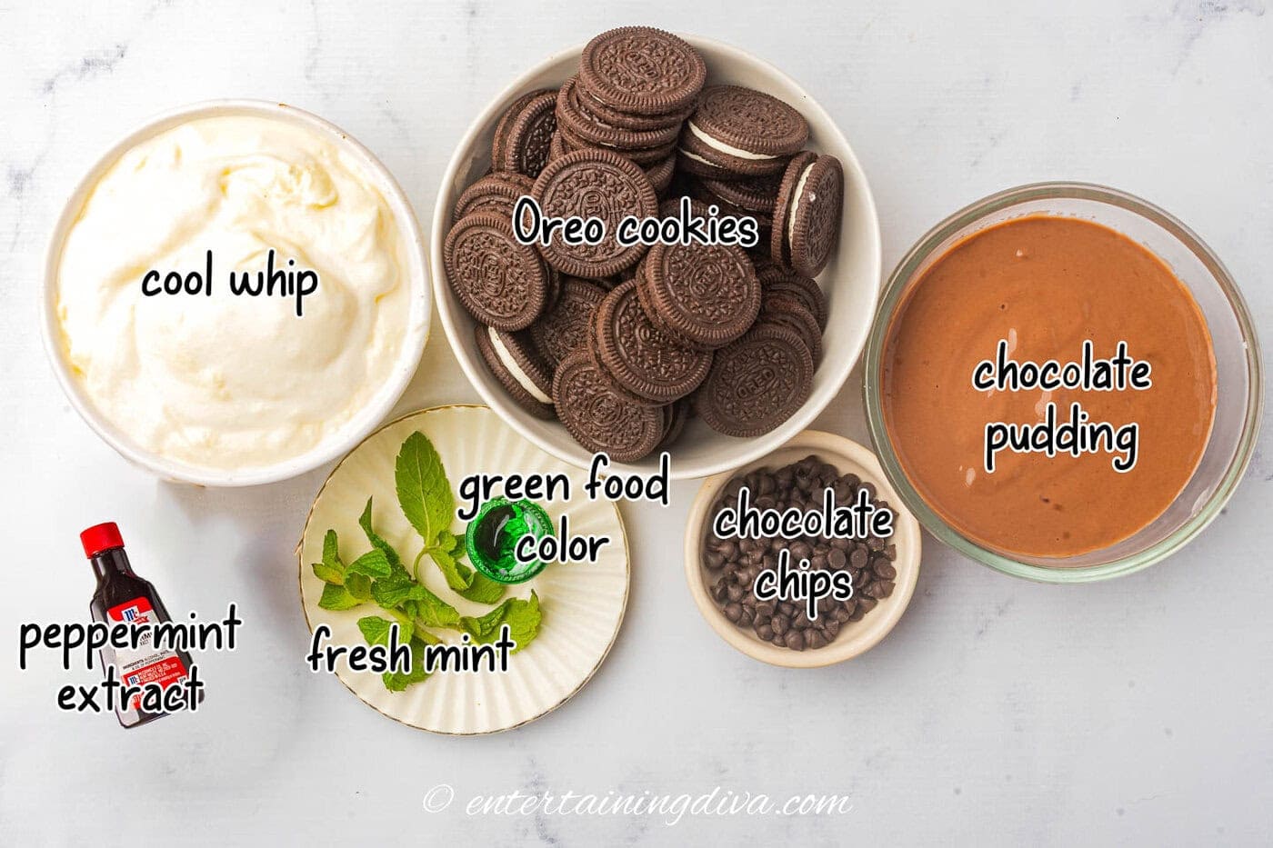 St Patrick's Day parfait ingredients - cool whip, peppermint extract, chocolate pudding, Oreo cookies green food color, fresh mint, chocolate chips