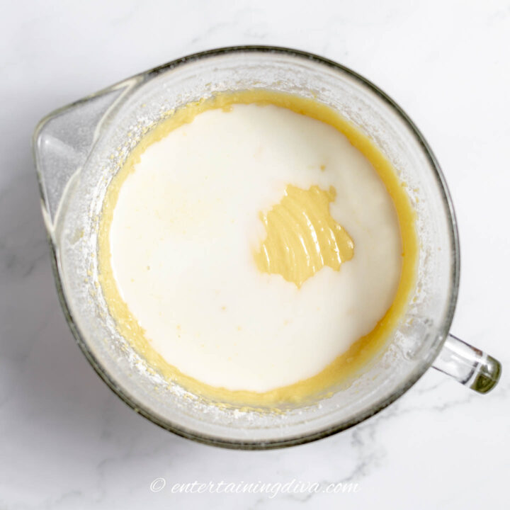 milk and lemon cake batter in a mixing bowl