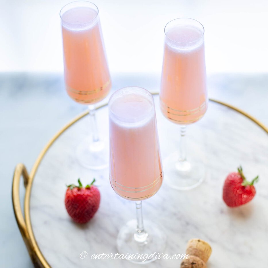 strawberry mimosas on a tray
