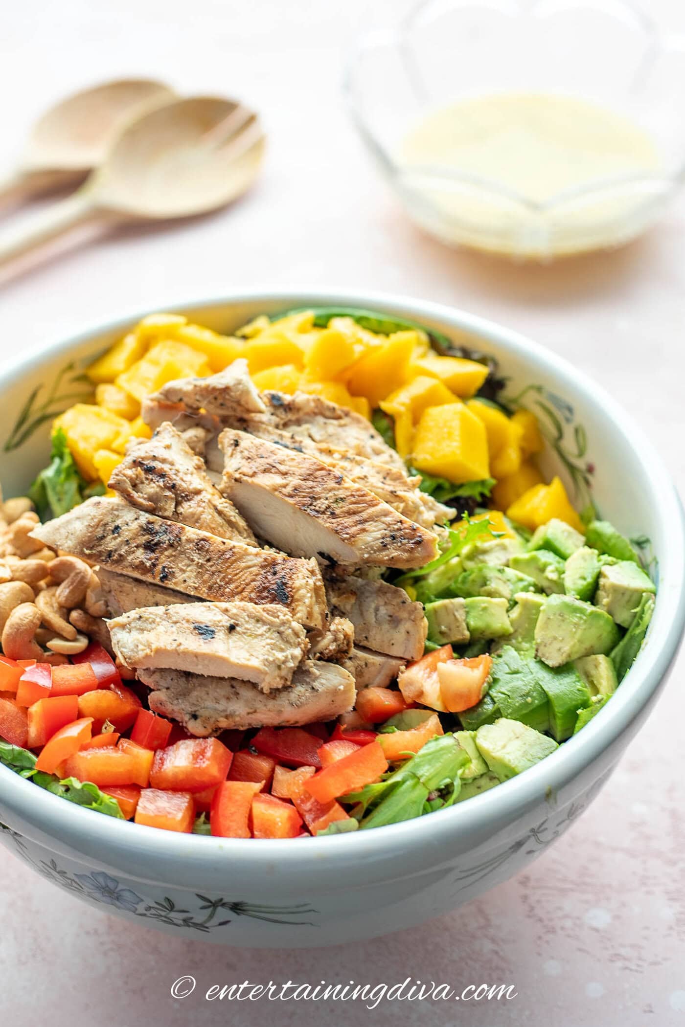 grilled chicken garden salad with fruit and nuts