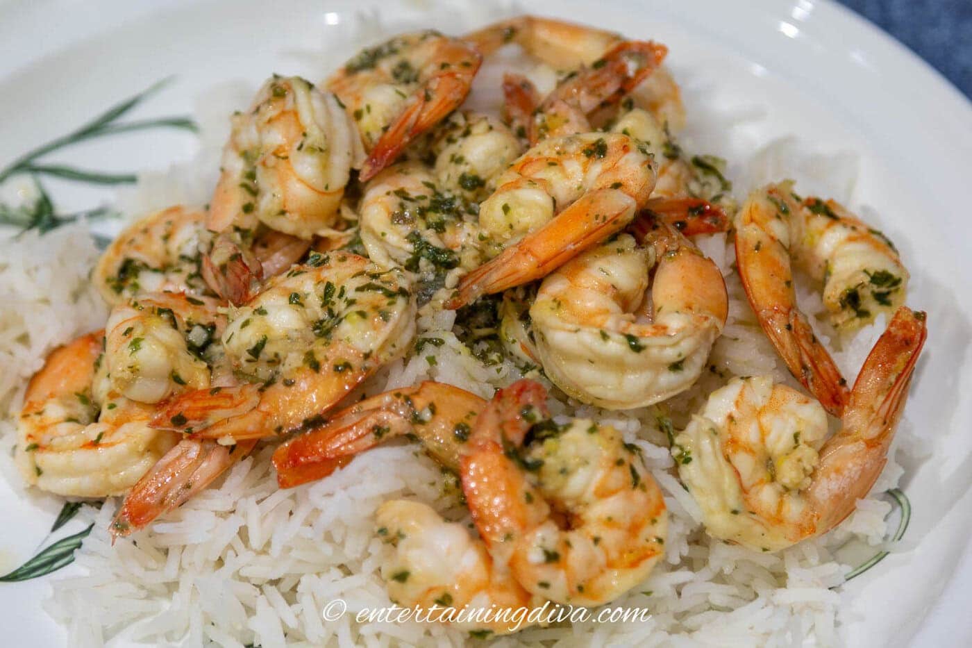 close up of Thai inspired red curry shrimp with rice on a plate