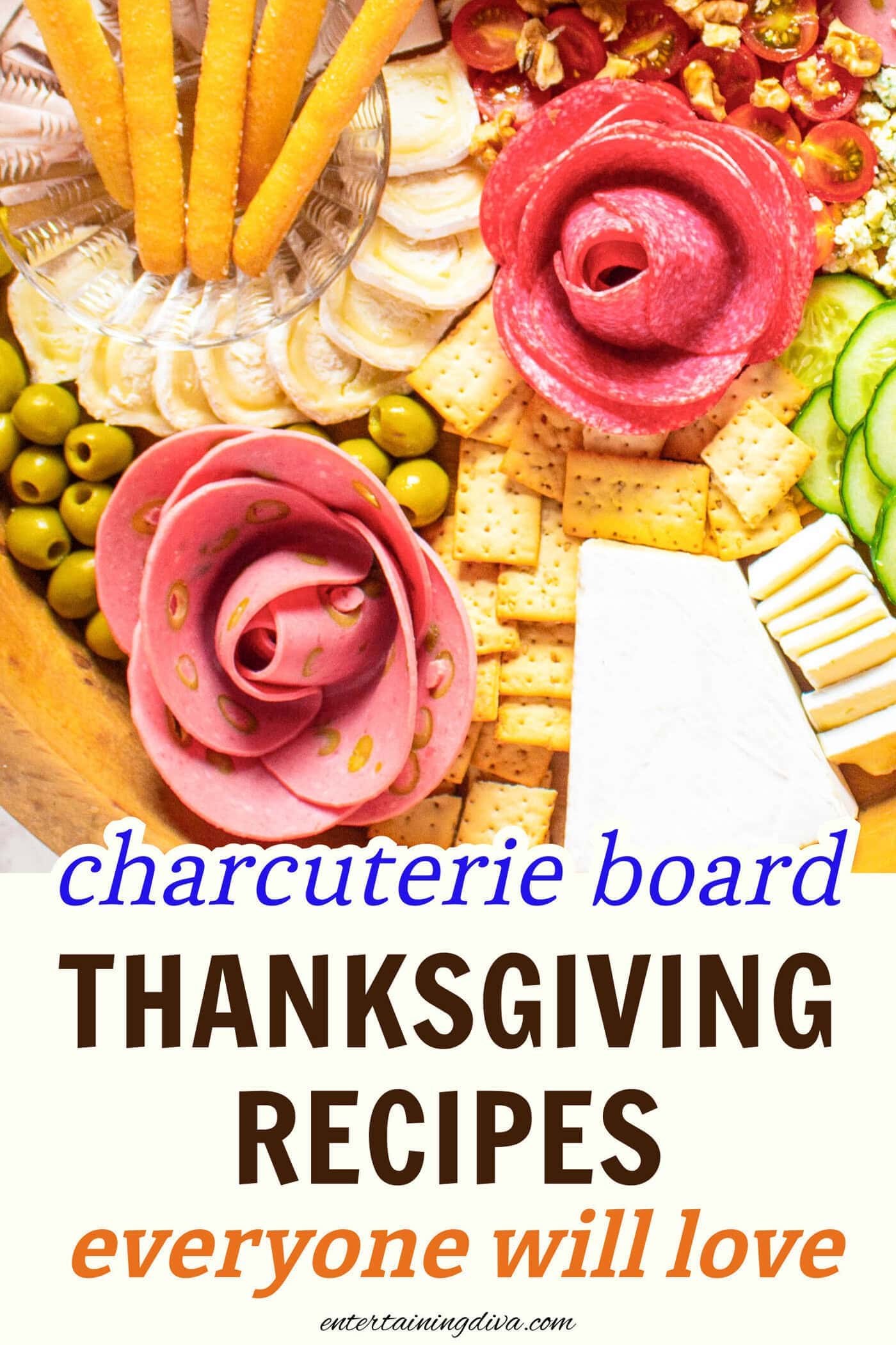 Charcuterie board with sliced meat shaped like roses
