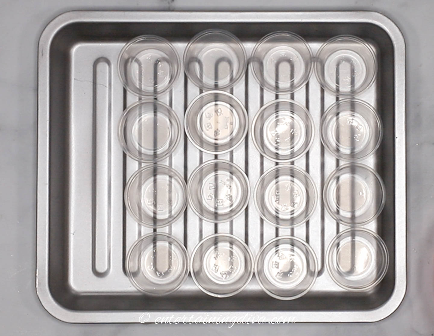 Empty Jello shot cups on a tray