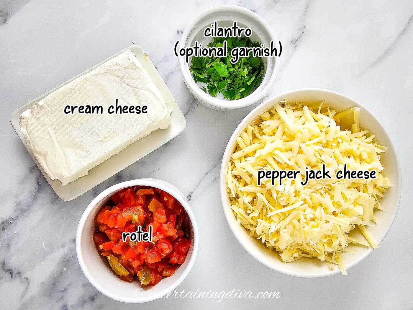 white queso ingredients - pepper jack cheese, cream cheese and rotel with Cilantro as garnish if desired