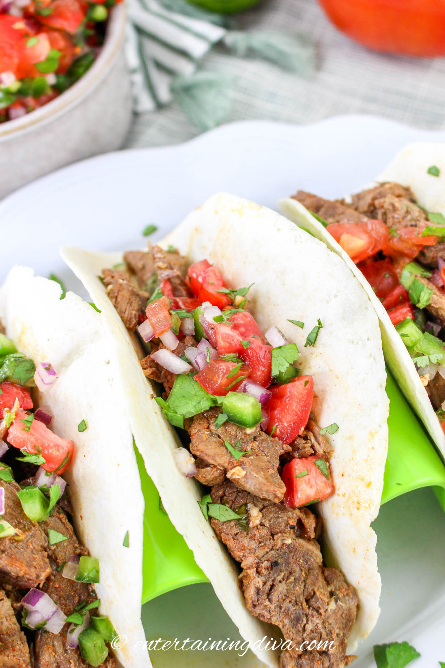 Pico de gallo served on top of tacos
