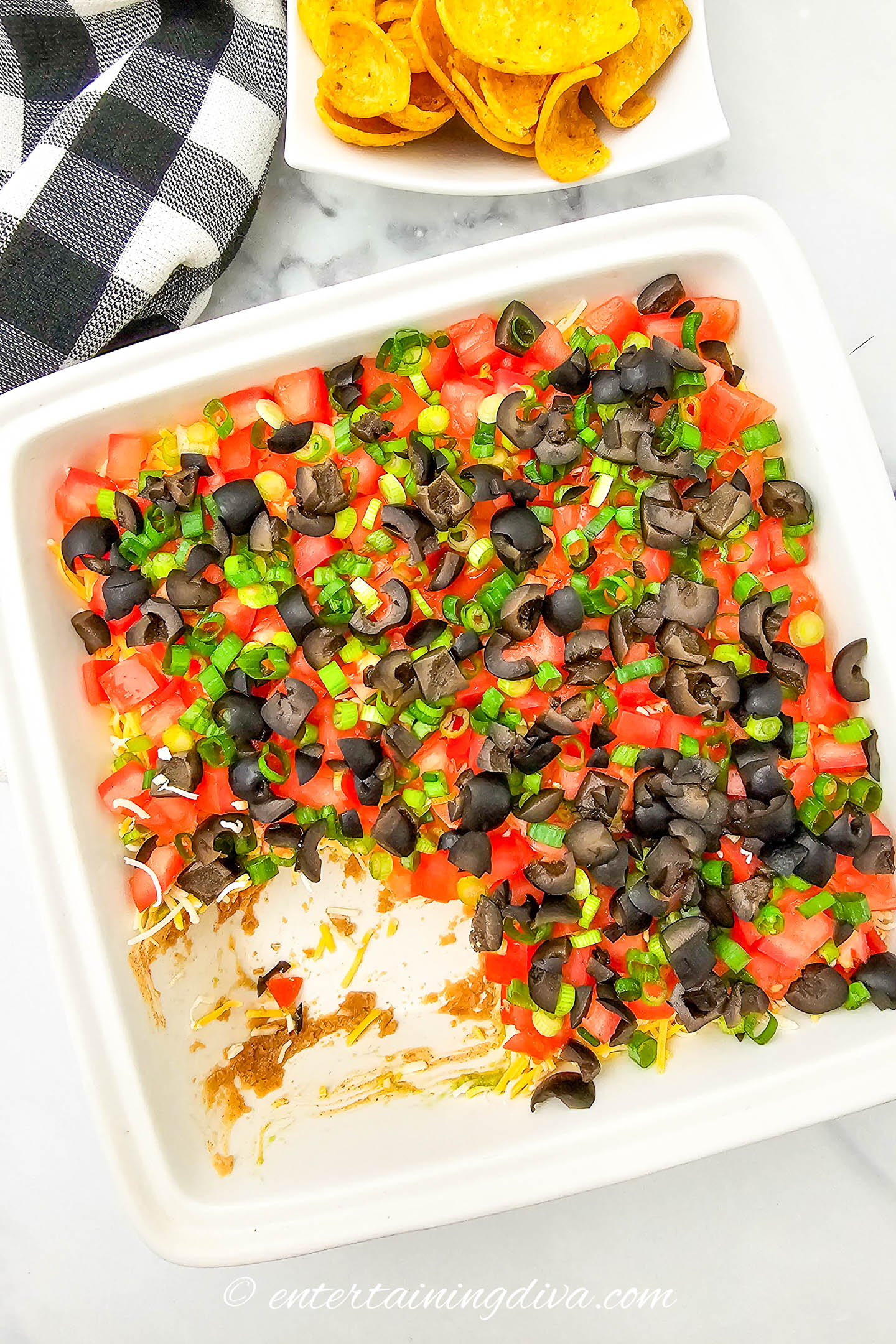 overhead picture of 7 layer dip with tortilla chips