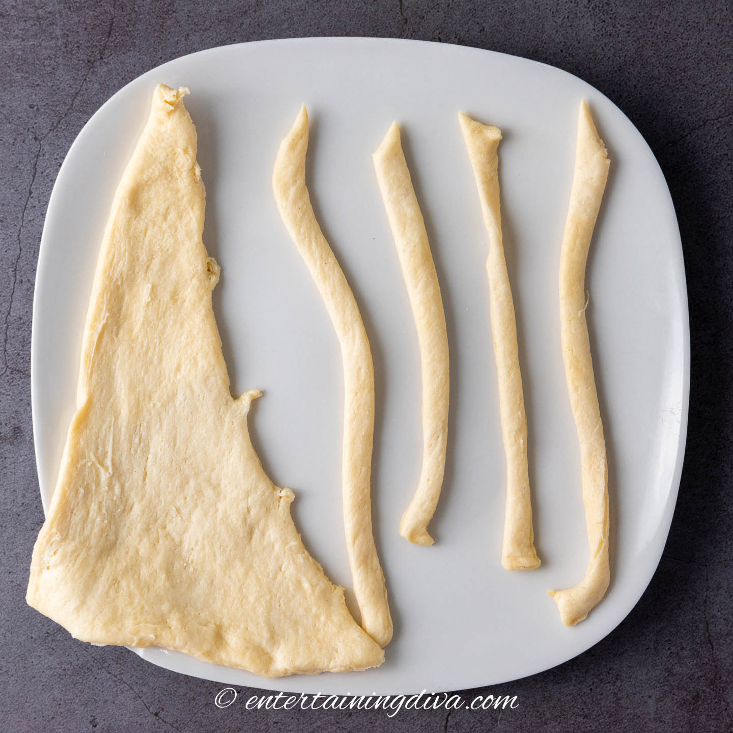 Crest roll dough cut into strips