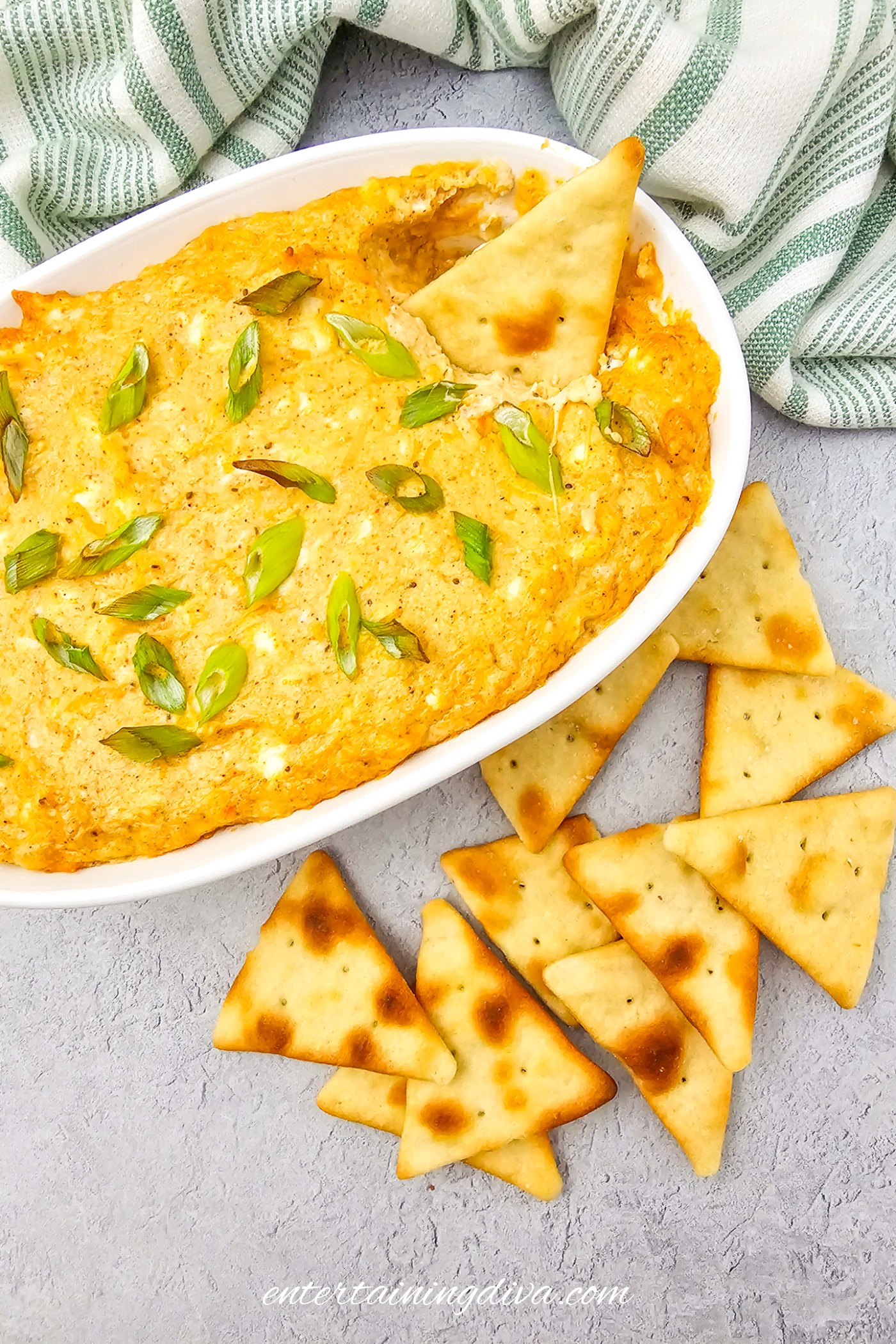 baked hot crab dip with lots of baked tortilla chips
