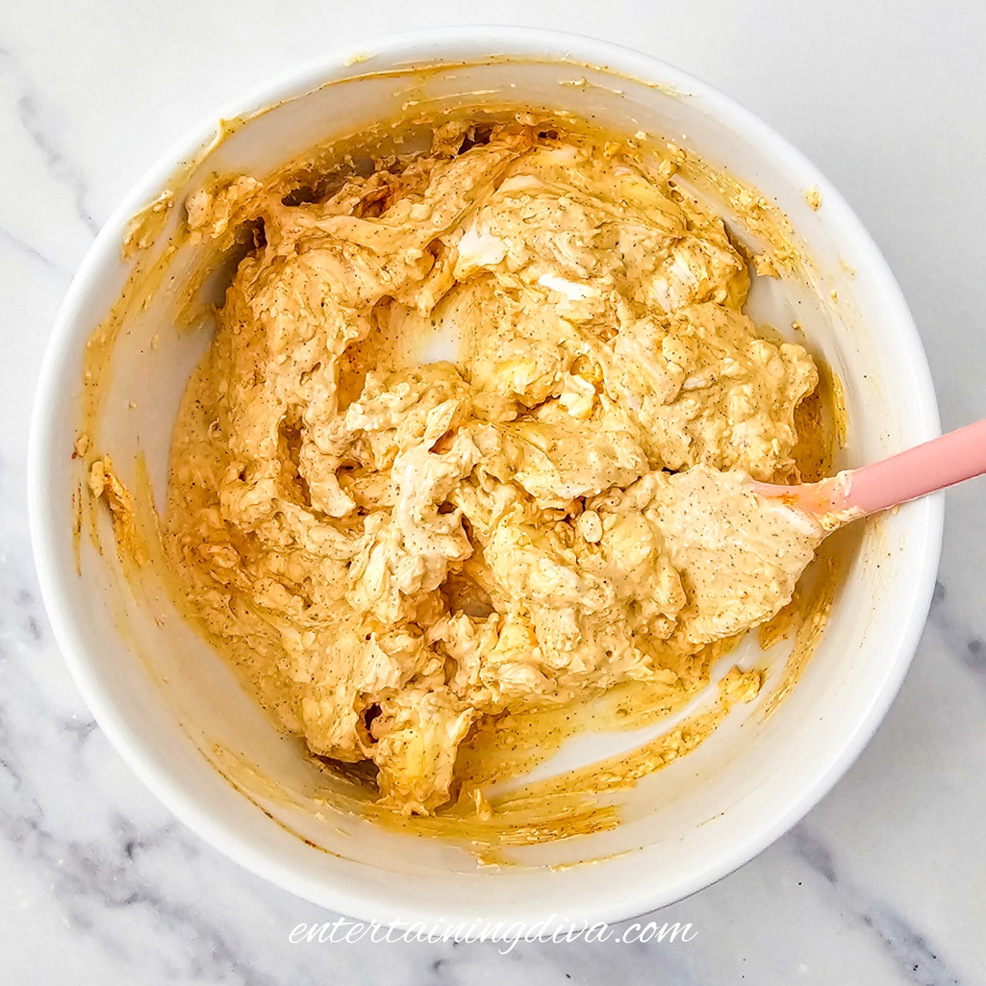 crab dip in a bowl after it has been mixed
