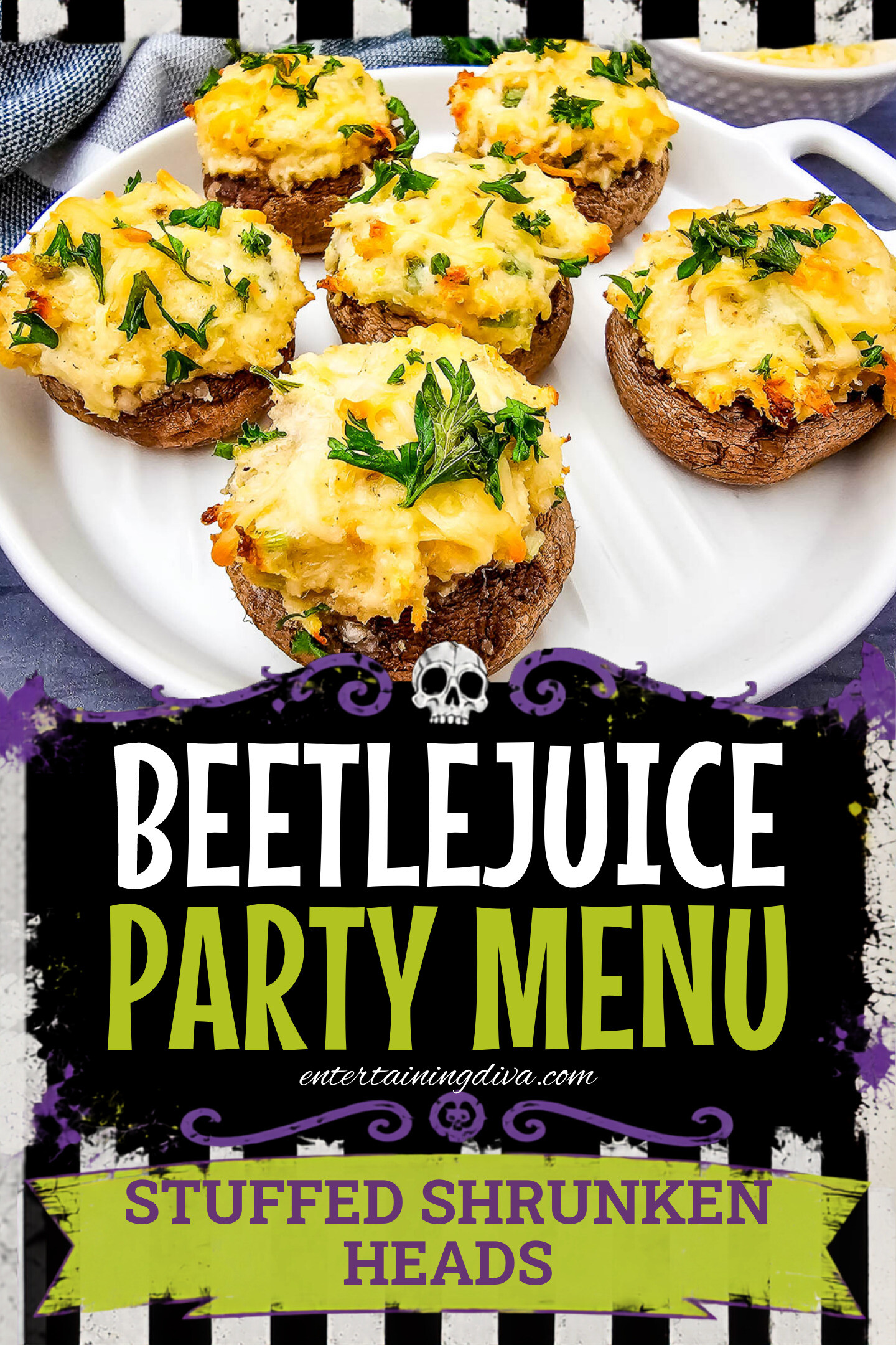 Five stuffed mushrooms topped with melted cheese and chopped parsley are arranged on a white plate, with a small bowl of grated cheese and a striped napkin in the background.