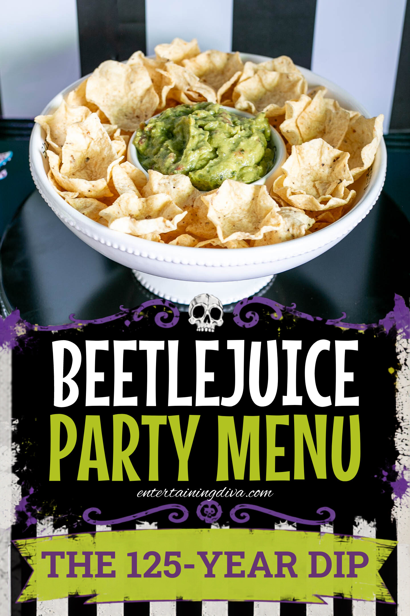 A white bowl filled with tortilla chips arranged around a small bowl of guacamole, placed on a black stand.