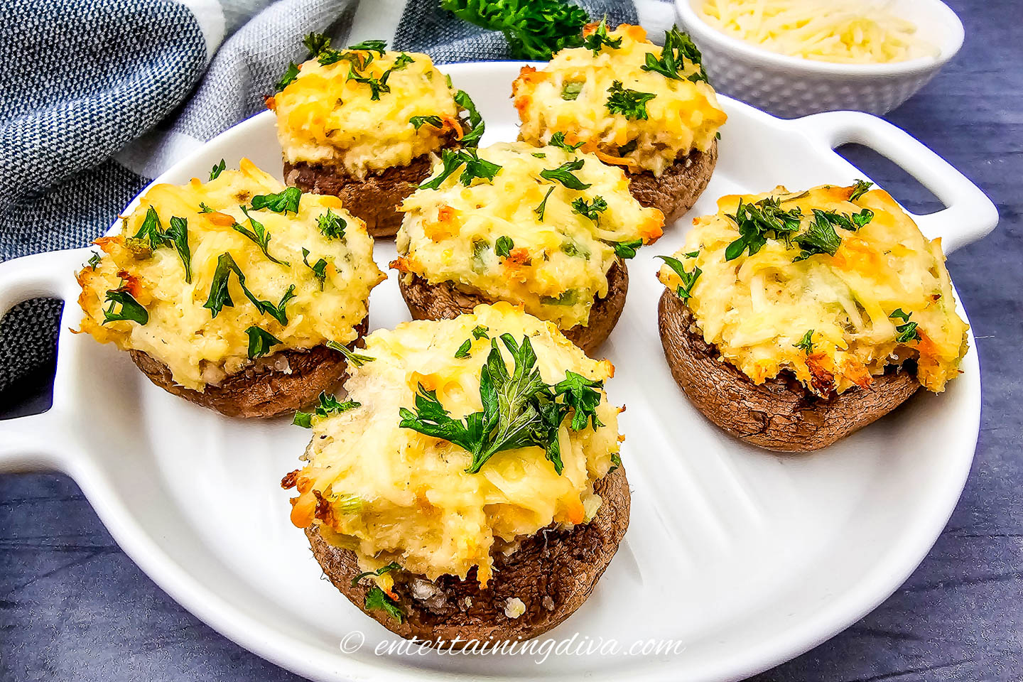 crab-stuffed mushrooms on a serving plate
