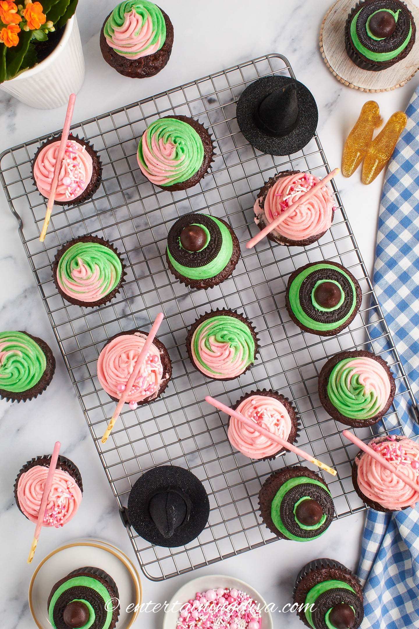 Wicked cupcakes on a cooling rack after being decorated