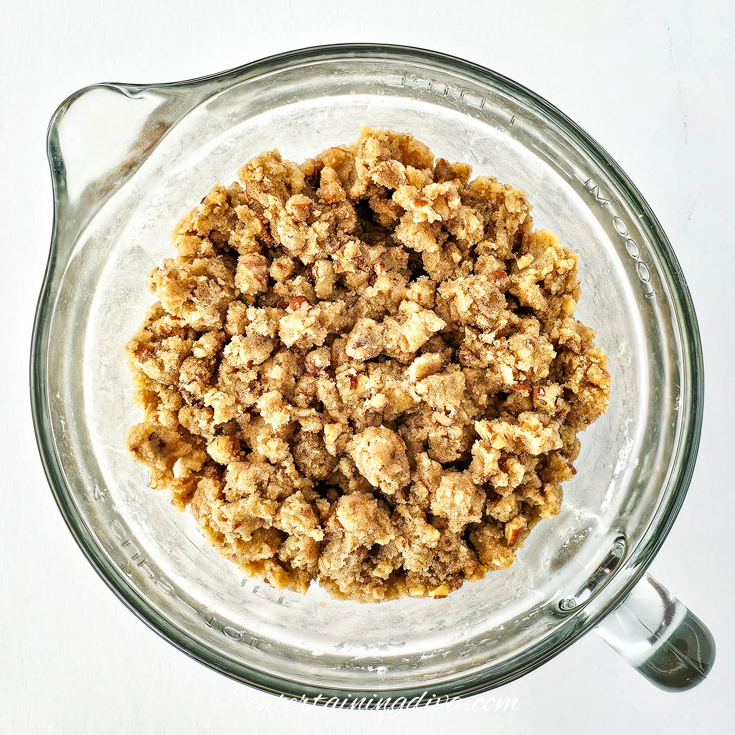 walnut crumb topping for apple crumb cake in a bowl