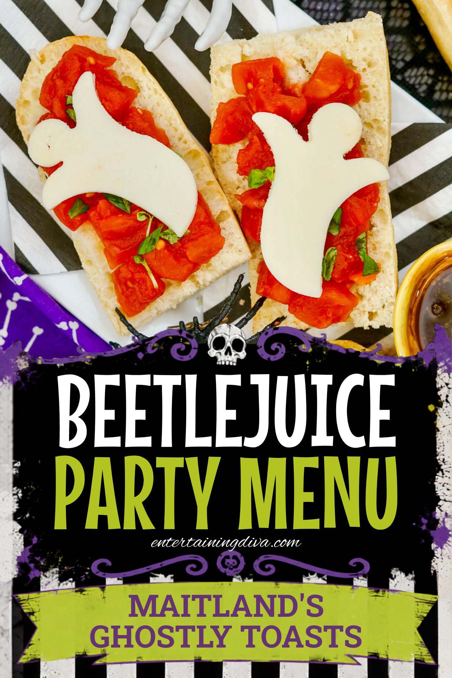 Two pieces of bread topped with diced tomatoes and ghost-shaped cheese slices, displayed on a black and white striped napkin with Halloween decorations nearby.